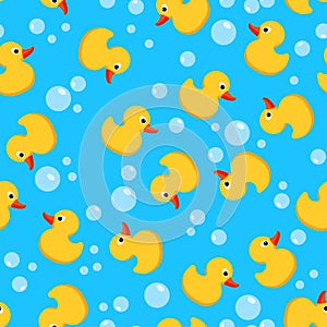 Vector seamless background with yellow rubber duck toy photo