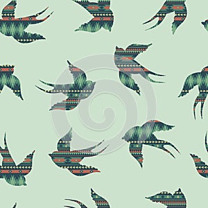 Vector seamless decorative ethnic pattern with swallows