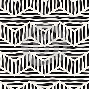 Vector seamless hand drawn pattern. Zigzag and stripe rough lines. Tribal design background. Ethnic doodle texture.