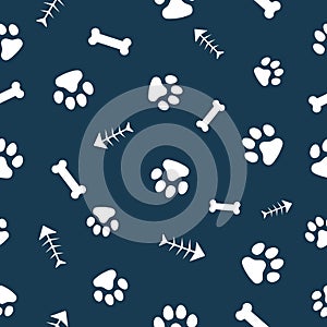 Vector, seamless pattern. Abstraction, white traces of paws of a cat, dog, fish bones on a dark blue background. For printing,