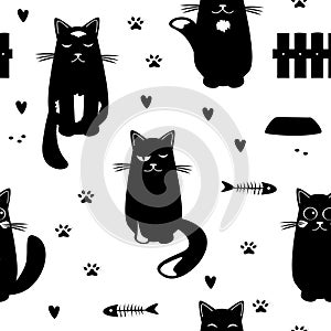 Vector seamless pattern with black cats, fish skeletons, hearts, and paw prints. Cartoon hand drawn design for children.