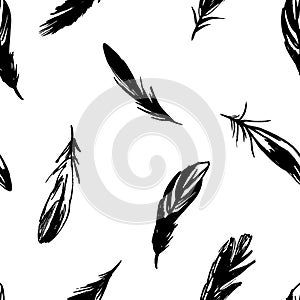 Vector seamless pattern with feathers on a white background