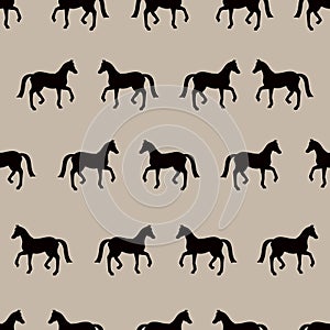 Vector seamless pattern with black horses silhouettes