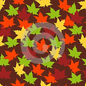 Vector seamless pattern with bright golden, yellow, orange, red and green maple leaves on brown background. Autumn leaf fall.