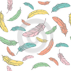 Vector seamless pattern with colored falling feathers on a white background in cute cartoon style. Hand drawn vector illustration