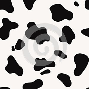 Vector seamless pattern of cow skin. Animal skin template. Black and white spotted cow texture