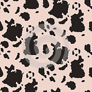 Vector seamless pattern with cow skin. Endless modern background.