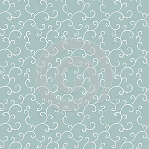 Vector seamless pattern. Curls from round points on a blue background.