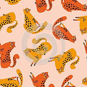 Vector seamless pattern with cute orange and red cheetahs on the pink background. Tropical animals.