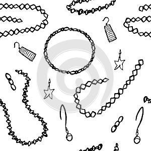 Vector seamless pattern with elegant necklaces,earings and bracelets.