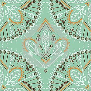 Vector seamless pattern with ethnic arrows, feathers and tribal ornaments.