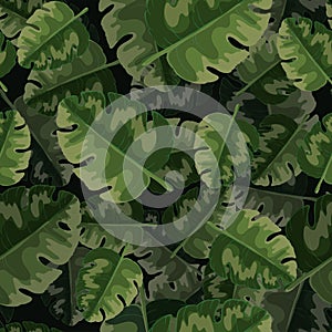 Vector seamless pattern of green palm leaves and tropical plants