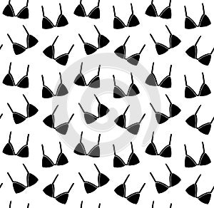 Vector seamless pattern of hand drawn black bra