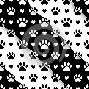 Vector seamless pattern. Pet prints. Cute paw. Background for pets, dog or cat. Foot puppy. Black silhouette shape paw. Footprint