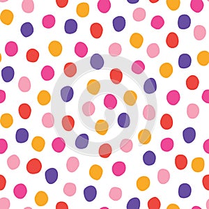 Vector seamless pattern with randomly placed colorful hand drawn polka dots on a white background