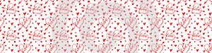 Vector seamless pattern of red hearts with an arrow and lettering love. Hand drawn texture