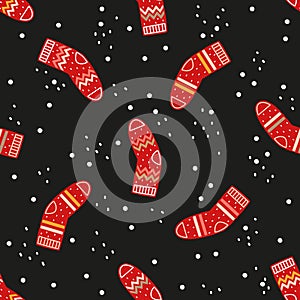 Vector seamless pattern. Red socks on a black background