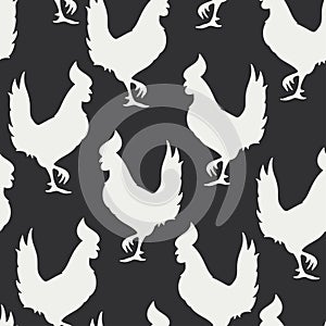 Vector seamless pattern with rooster white silhouettes on a black background