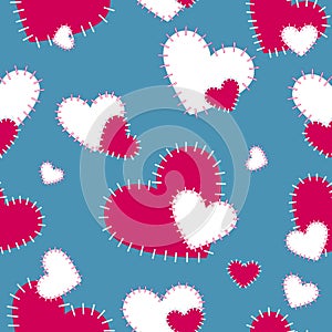 Vector seamless pattern sewn with red and white hearts on a blue-gray background. Scrapbooking paper. St. Valentine`s Day.