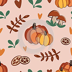 Vector seamless pattern. Subject illustration: pumpkins, citruses, mushroom, little hearts and autumn leaves