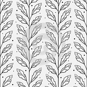 Vector seamless pattern with vertical black branches with leaves on grey background.