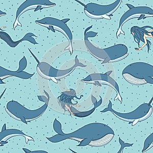 Vector seamless pattern with whales, mermaids, narwhals and dolphins on the dotted blue background. Sea creatures, sirens and mar photo