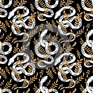 Vector seamless pattern with white snake silhouettes with tribal decorations and gold stems on a black background