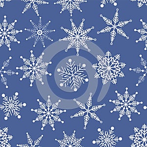 Vector seamless pattern. Winter wonderland delicate white snowflake crystal on blue background..