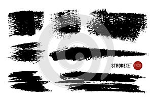 Vector set of hand drawn brush strokes and stains. One color monochrome artistic hand drawn backgrounds and graphic