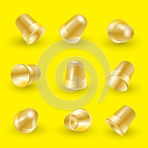 Vector set of isolated gold thimbles on a yellow background