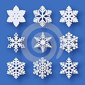 Vector set of 9 paper cut snowflakes with shadow