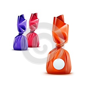 Vector Set of Realistic Chocolate Candies in Orange Pink Blue Glossy Wrapper Close up on White Background