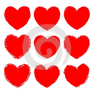Vector set of red grunge art hearts. Ink rough texture