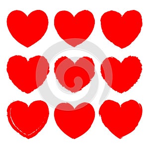 Vector set of red grunge art hearts. For Valentine`s Day greetings