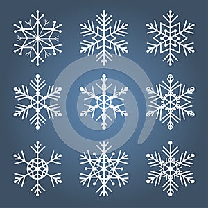 Vector set of snowflakes in linear style. Ð¡ollection of white snowflakes on blue background