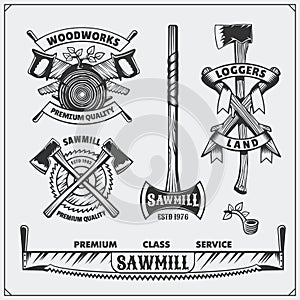 Vector set of vintage Lumberjack logos, labels and emblems. Axes and saws.