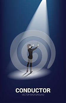 Vector silhouette of conductor with spot light.