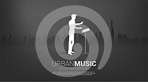 Vector silhouette of conductor standing with city background.