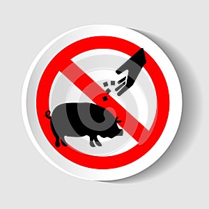 Vector silhouette of do not feeding pig mark on white background. Symbol of prohibition