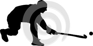 Vector silhouette of field hockey player with a hockey stick