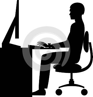 Vector silhouette of a man sitting working at the computer