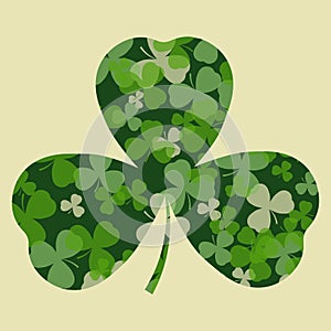 Vector St Patrick's day card. Green clover leaves on clover heart shape and white or beige background