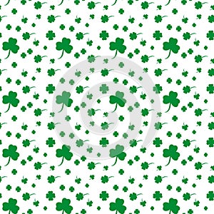 Vector St. Patrick's day seamless pattern with green shamrock leaves on a white background.