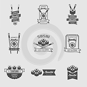 Vector Sushi logotypes set. 9 logos with sushi rolls and chopsticks.