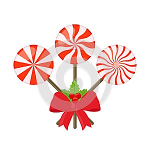 Vector sweet lollipops with red ribbon and holly