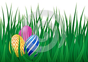 Vector template with realistic green grass and decorated Easter eggs