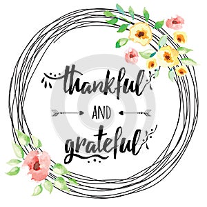 Vector thankful grateful hand drawn text into flower wreath photo