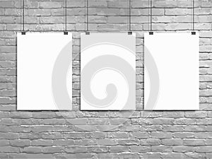 Vector Three poster mockup white brick wall