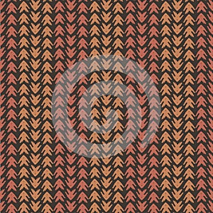 Vector tribal arrow style grunge seamless pattern background. Painterly chevrons in vertical brown and terracotta