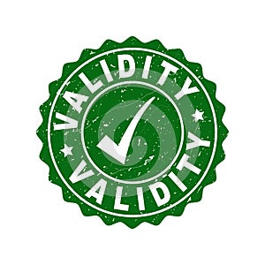 Validity Scratched Stamp with Tick photo